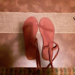 Free People Bohemian tie up leg sandal.